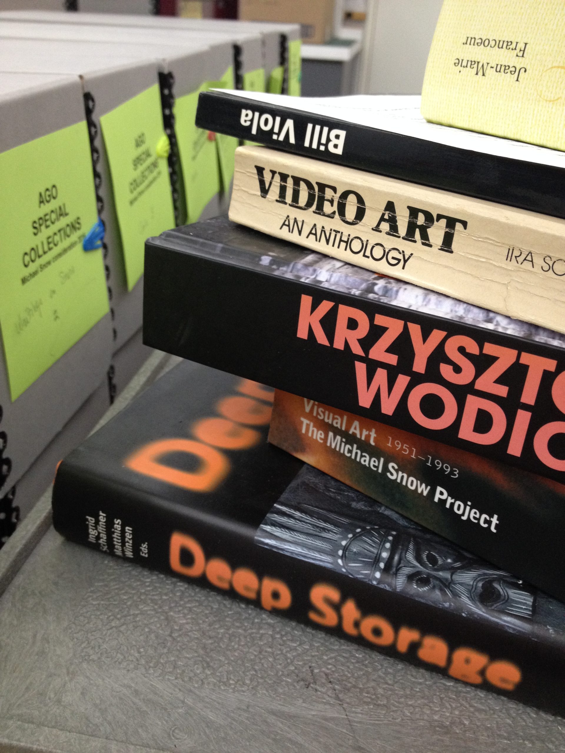 stack of art books video art an anthology, bill viola, deep storage and the michael snow project